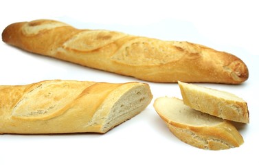 Baguette, sliced, isolated on white background