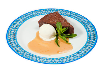 Piece of chocolate cake on white isolated background