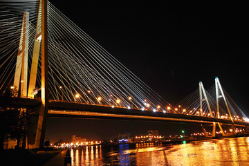 Obraz premium Big cable-stayed bridge at night, St.Petersburg