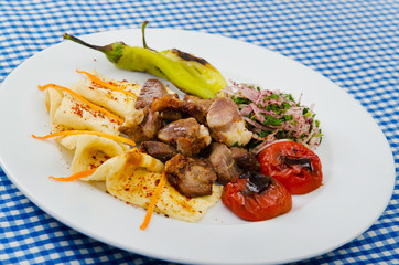 Meat cuisine - kebab served in plate