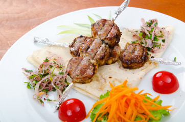 Meat cuisine - kebab served in plate