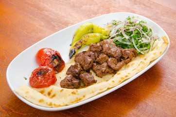 Kebab served in the plate