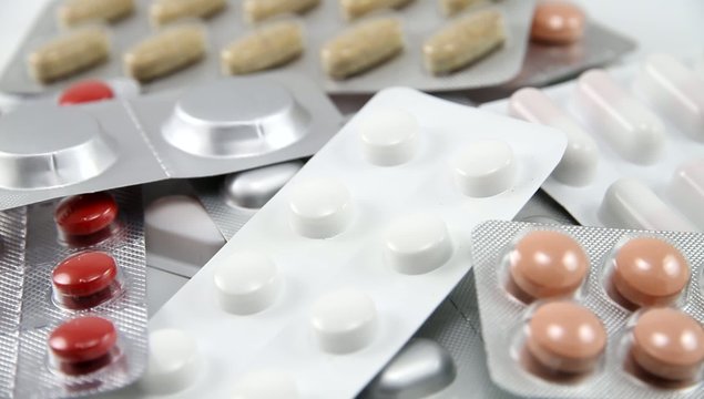 Medical pills packages rotating