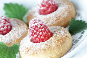 Cookies with a raspberry and powdered sugar