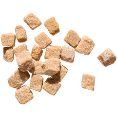 roughly cut cubes of brown sugar, isolated