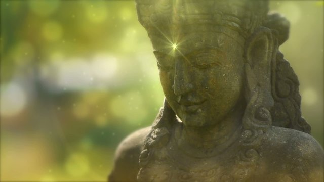 Statue in beautiful garden.