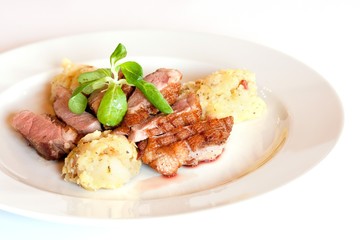 Grilled meat and potato salad