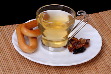 Tea with sugar and bagel