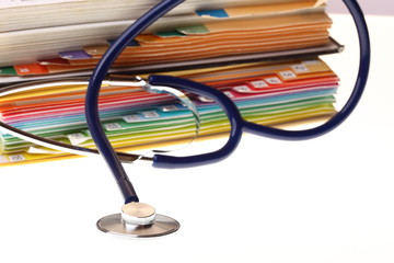 books and stethoscope isolated