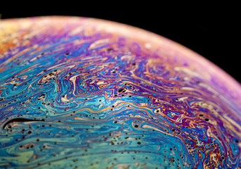 Macro closeup of a colorful soap bubble