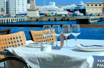 Naklejka premium restaurant on quay in port of Barcelona ,Port Well