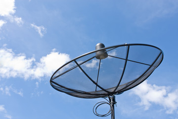 satellite dish and cloudy blue sky background