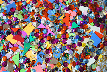 Scrap materials of different colors and shapes.