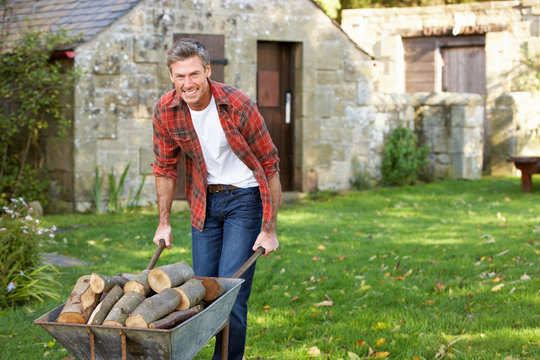 Man Working In Country Garden