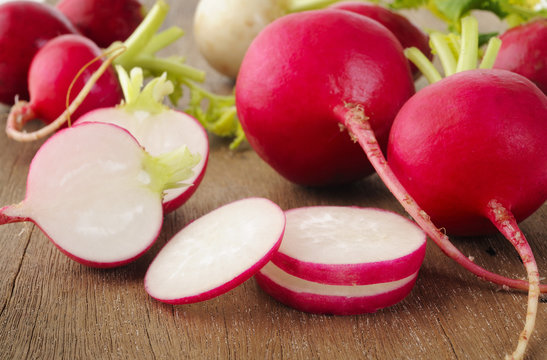 radishes on wooden table