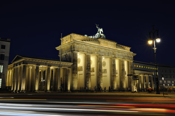 Brandenburg gate illuminated at night in Berlin