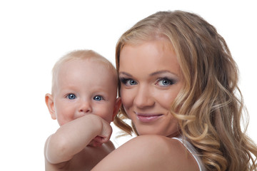 Beauty blond mother with baby look on camera