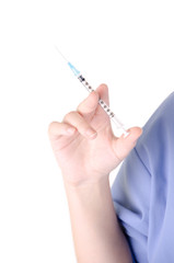 Nurse holding syringe in hand