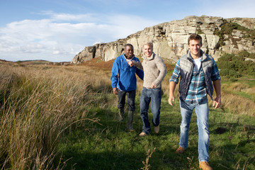 Fototapeta na wymiar Young men on country walk