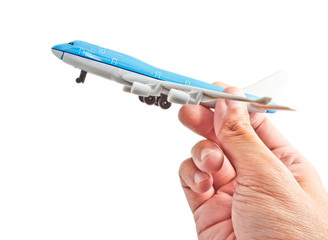 hand holding an air craft model