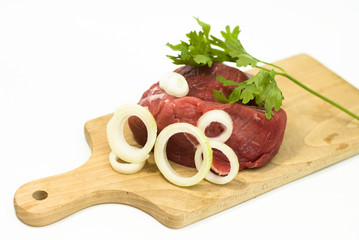 fresh meat beef with vegetables on white background