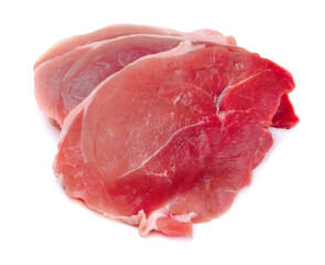 Three raw fresh juicy pork steaks