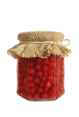 Canned red currant berries in jar - isolated