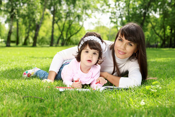 Fototapeta premium Mother with her daughter outside