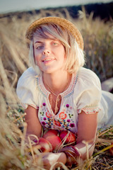 Image of young woman on wheat field