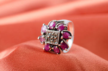 Fashion concept with ring on background