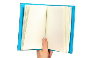 Hand and notebook. Close up