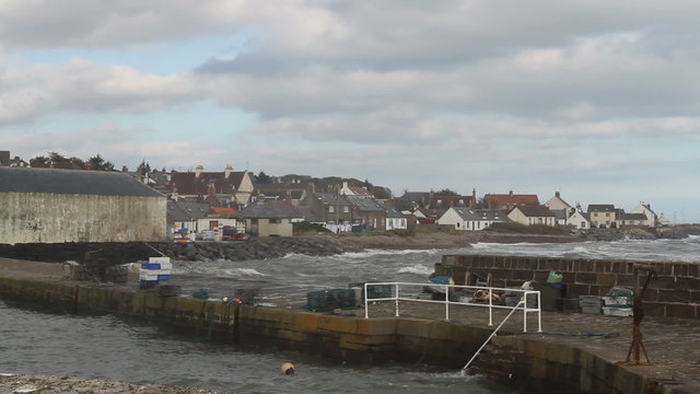 waves crashing at high tide Johnshaven Scotland