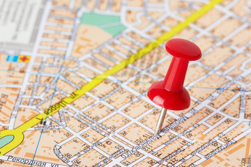 Red pushpin on a map