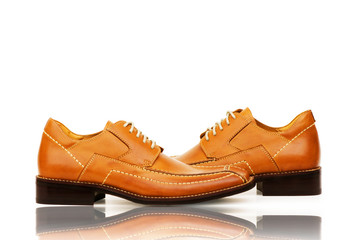 Fashion concept with male shoes on white