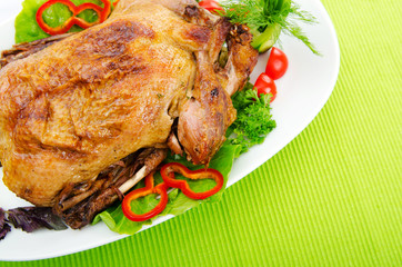 Roasted turkey on the festive table