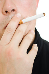 A man with a cigarette in his mouth.