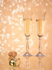 Champagne glasses, focused on cork