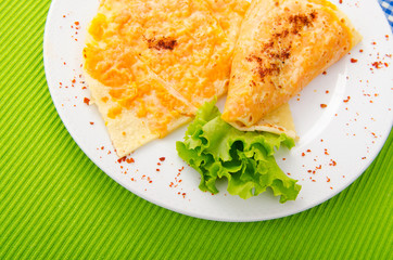 Pancakes stuffed with mashed pumpkin