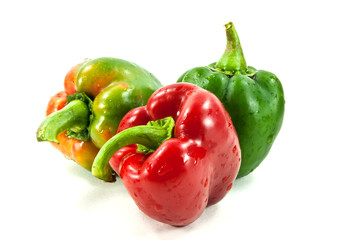 Three fresh sweet pepper shot on white background.