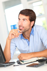 Fototapeta premium Office worker with thoughtful look