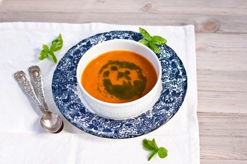 spicy tomato soup with basil oil