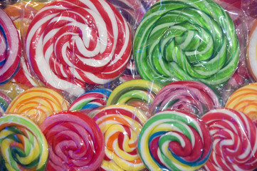 Fototapeta na wymiar Colorful lollipops in plastic