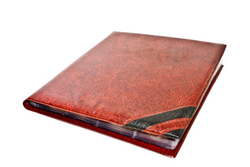 a red diary on white background