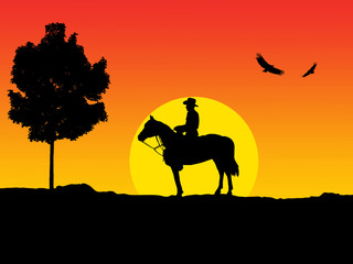 Cowboy enjoying the sunset