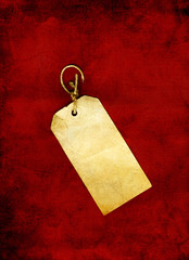 Christmas paper tag on red