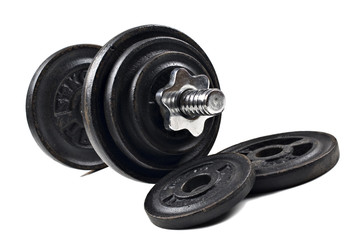 Obraz na płótnie Canvas Black dumbbells and loose weights