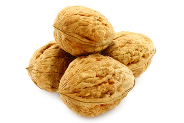 Walnuts close-up on a white background