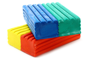 Colour plasticine close-up on a white background