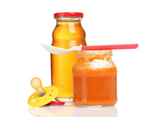 baby food and spoon isolated on white