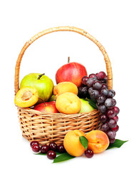 Naklejka na ściany i meble tasty summer fruits in backet isolated on white